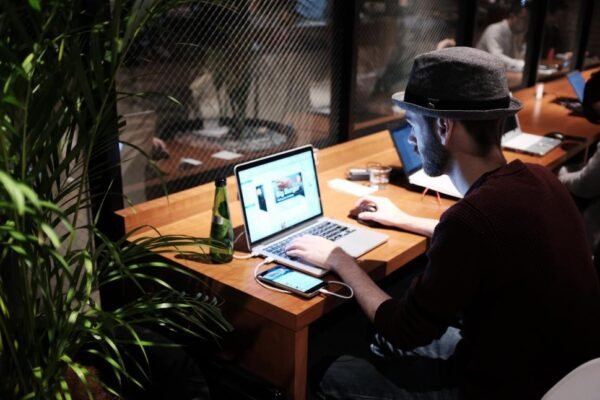 man sitting at a desk