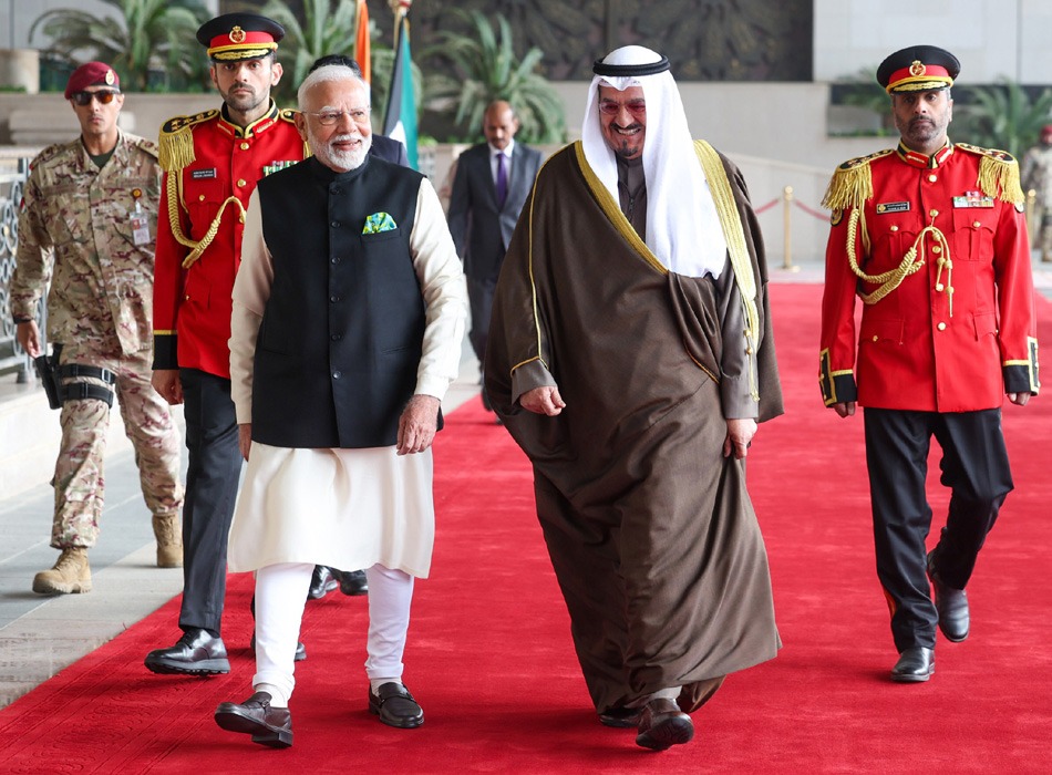 PM receiving Guard of Honour at Bayan Palace, in Kuwait on December 22, 2024.