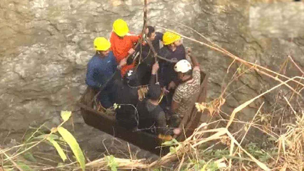 workers in the coal mine..one's dead body was exhumed