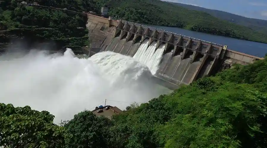 Krishna River flood 2025 at Srisailam reservoir with open spillway gates