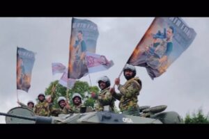 యూకేలో ఎన్‌టీఆర్ ఫ్యాన్స్ హంగామా : యుద్ధ ట్యాంక‌ర్ల‌తో ర్యాలీ