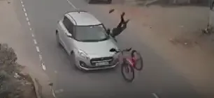 Boy thrown into the air after being hit by a car