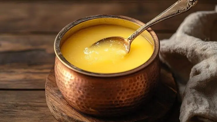Applying Ghee on Navel