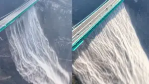 ప్రపంచంలోనే ఎత్తైన వంతెన నుంచి జాలువారుతున్నకృత్రిమ జ‌ల‌పాతం