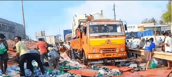 Nellore Lorry Accident: Soft Drink Truck Overturns—Crowds Swarm the Scene